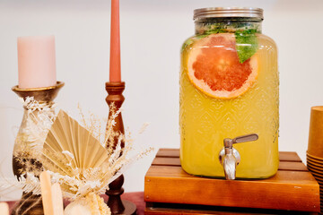 Catering. big lemonade with a drink and grapefruit. self-service at banquets and holidays. buffet.