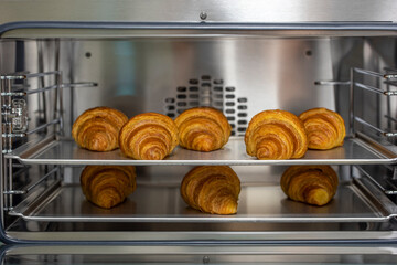 tray with freshly baked croissants