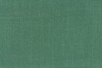 Surface of cotton linen tablecloth kitchen (napkin) green color texture background.