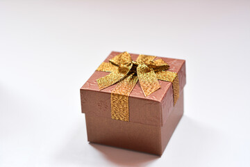 gift box with gold ribbon