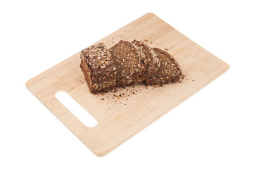 Sliced rye bread on cutting-board isolated on white background