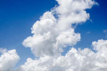 Naklejka na ściany i meble The blue sky and white clouds in sunny day