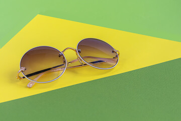 Sunglasses on a colored background. Isolate. Healthy eyes.