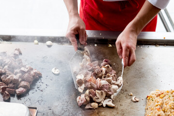 chef preparing meat