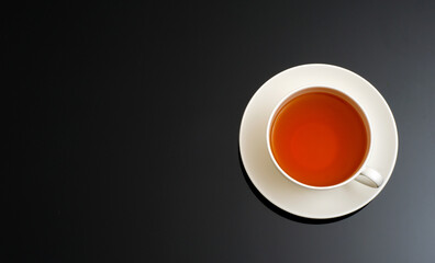 Cup of tea on dark background