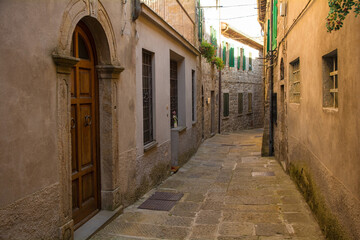 Fototapeta na wymiar A street in the historic medieval village of Santa Fiora in Grosseto Province, Tuscany, Italy 