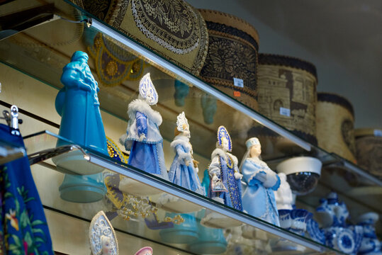 Dolls of the Snow Maiden in blue folk costumes and kokoshniks