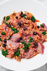 organic dog food. cold cuts with herbs and berries. close-up