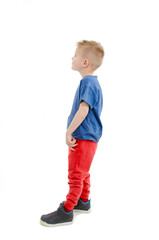 Casual little boy looking on copy space. Isolated on white background 
