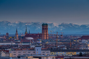 Fototapeta premium Munich night skyline aerial ina background pre alps moinutains