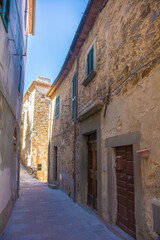 Fototapeta na wymiar A quiet residential street in the historic medieval village of Scansano, Grosseto Province, Tuscany, Italy 