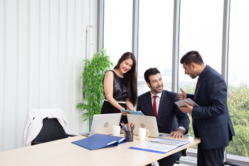 Happy attentive male team leader listening to new project idea in the office, Team meeting and interesting discussion concept