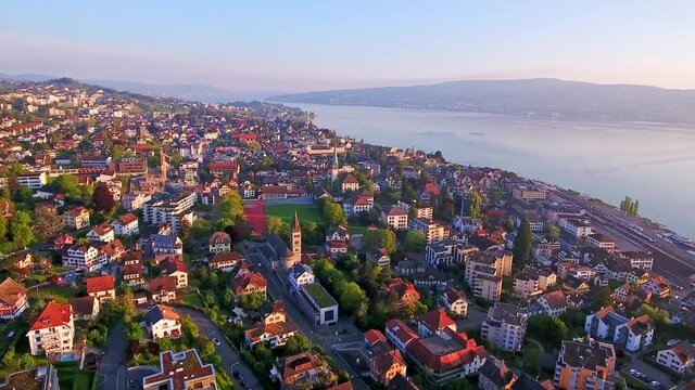 High altitude rotating view of W&auml;denswil in Horgen, Zurich, Switzerland in the spring