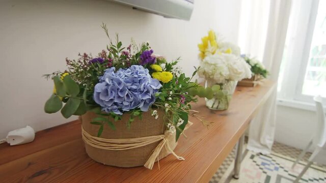 Flower Vases on a Wooden Shelf