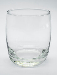 Glass of water on the white background, close up