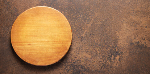 Pizza or bread cutting board for homemade baking on table. Food recipe concept at stone background texture