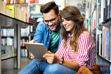 Young university students studying together. Group of multiracial friends in college