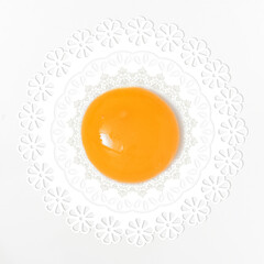 Abstract yolk egg and Vintage lace doily