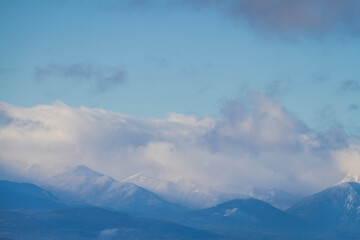 The Olympic mountains of Washington State with Puget Sound in the foreground.