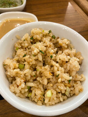 Garlic fried rice on white dish.