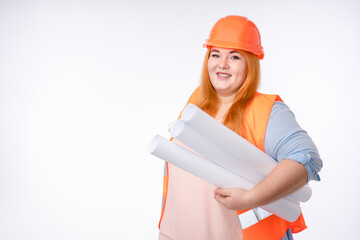 Confident plus size woman engineer with architectural plan in hardhat isolated over white background