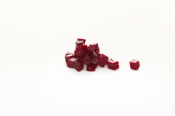 Vegetable boiled cubes on white background