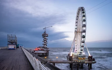 Deurstickers Popular Ferris wheel on the pier of Scheveningen, The Hague. © Erik_AJV