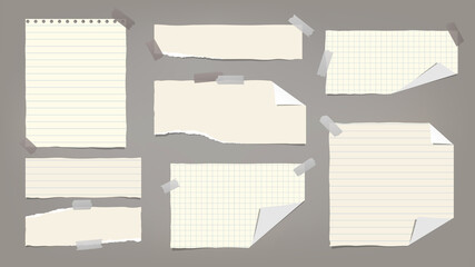 Set of torn yellow note, notebook paper pieces with folded corners stuck on dark grey background. Vector illustration