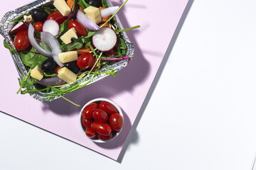 Healthy vegan take away salad in aluminum container