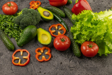 Healthy eating. Fresh vegetables. On a black concrete background. View from above