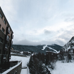 Fototapeta premium Snow and clouds in the mountains