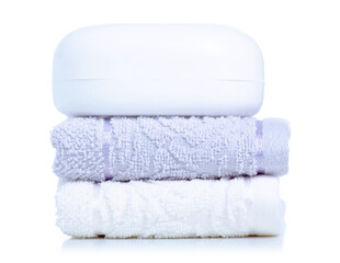 White soap with towels for hand on white background isolation