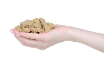 Kinetic sand art in hand on white background isolation