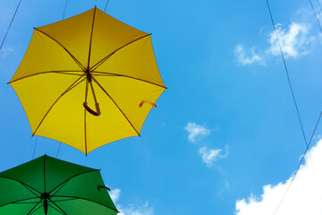 Yellow and green umbrellas background