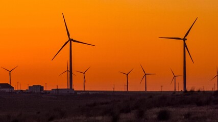 Wind turbines at sunset in the state of Idaho, Scenic view of wind turbines power generator