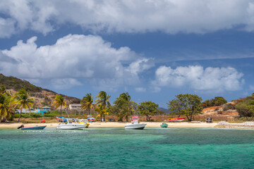 Caribbean, Grenada, Union Island. Boats at anchor in Clifton harbor.