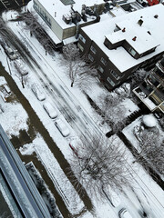 snow covered city in winter, top view on the street