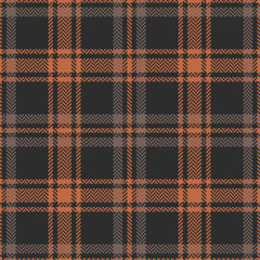 Tartan plaid pattern autumn winter in brown and orange. Seamless herringbone textured check plaid graphic art background for flannel shirt, skirt, other trendy casual fashion textile print.