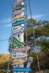 Caribbean, Grenada, Mayreau Island. Signs on boat mast.