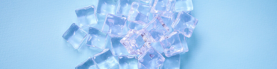 ice cubes imitation artificial plastic pieces transparent acrylic not real cold, illusion ready to eat on the table outdoor top view copy space for text food background