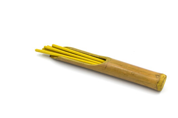 Incense sticks with the scent of jasmine. Indonesian incense sticks for relaxation. White background.