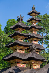 The architecture of the Hindu temple on the island of Bali in Ubud, Indonesia, Asia. High thatched roof tower