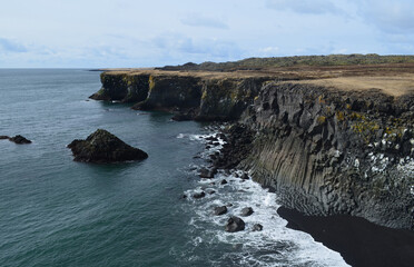 Beautiful Basalt Column Rock Cliffs Along the Coastline of Iceland