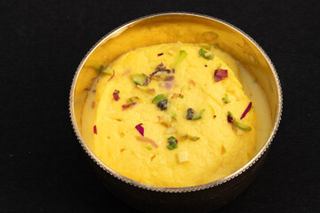 Special Bengali Chhena Mithai Rasmalai Also Known As Rossomalai Rasamalei Ras Malai Roshmolai Made Of Fresh Curdled Milk Pista Meetha Doodh And Kesar. Soaked In Milk Cream And Served In Brass Bowl