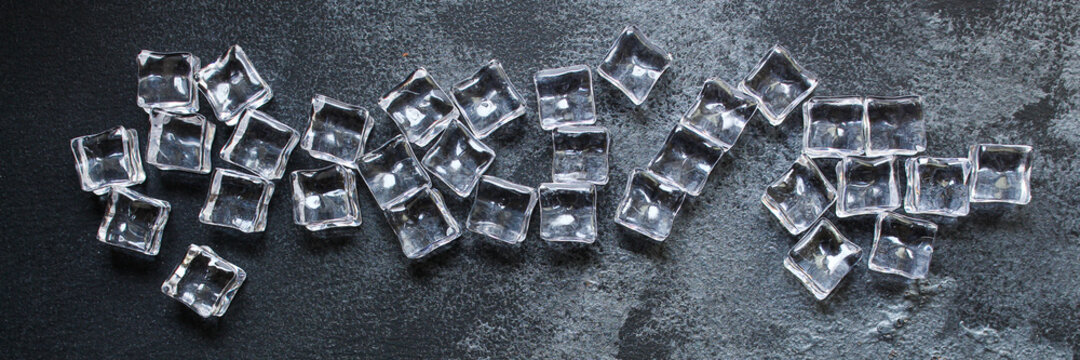ice cubes imitation artificial plastic pieces transparent acrylic not real cold, illusion ready to eat on the table outdoor top view copy space for text food background