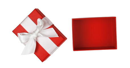 Open empty red gift box with white satin ribbon bow isolated on white background