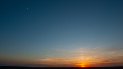 Sunset over the hills in the countryside.