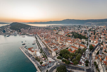 Aerial drone shot of Diocletian Palace by port riva in Split old town in sunset in Croatia