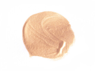 Foundation smear on a white background. A speck of makeup isolated.