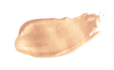 Foundation smear on a white background. A speck of makeup isolated.